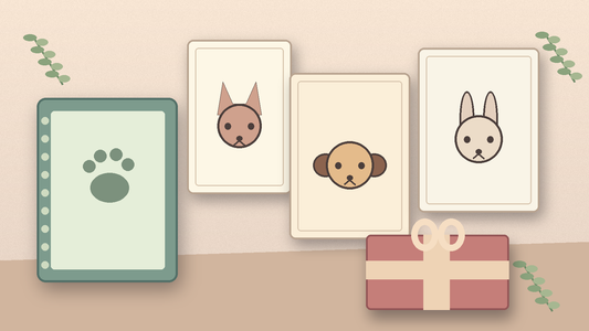 Illustrated gift table with cat, dog and rabbit portrait cards, a paw-print notebook, a ribboned parcel and leafy sprigs